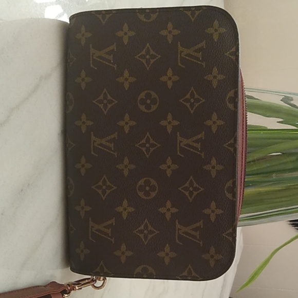Ginormous Louis Vuitton wristlet - Picture 1 of 7